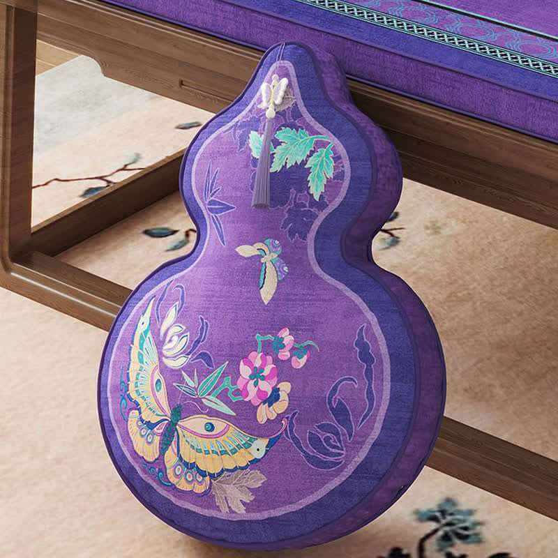 Coussin décoratif à motifs papillons et fleurs - image 1