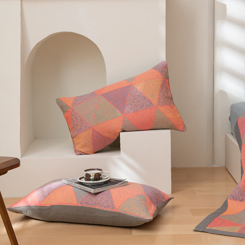 Couette réversible en coton à motif triangulaire