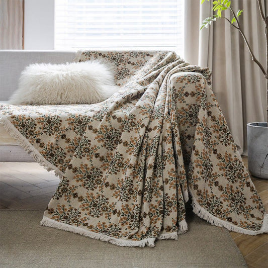 Housse de canapé avec pompon jacquard et motif fleur de prunier