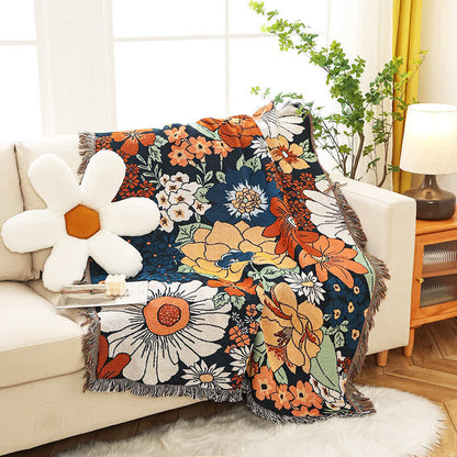 Couverture fonctionnelle à pompons avec fleurs lumineuses