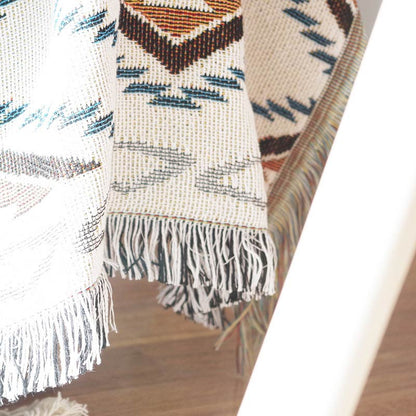 Couverture de salon bohème en tricot avec pompon