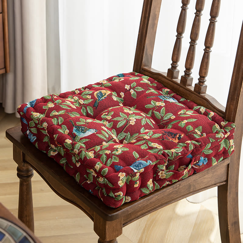 Coussin de chaise et de sol en jacquard motif feuilles d'oiseaux