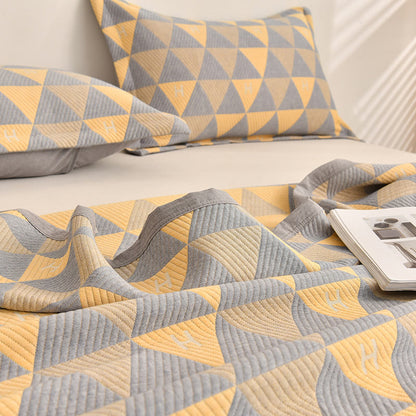 Couette en coton Ownkoti grise et jaune à motif triangulaire