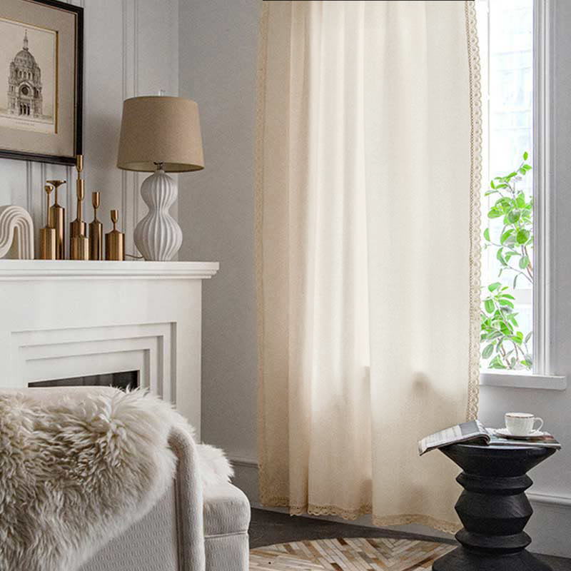 Rideau en coton blanc avec ourlet et pompon