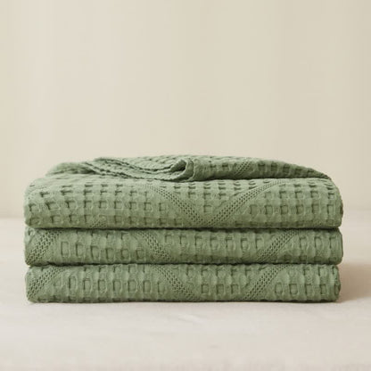 Couverture en serviette avec structure gaufrée de couleur unie