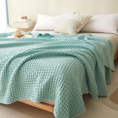 Couverture en serviette avec structure gaufrée de couleur unie