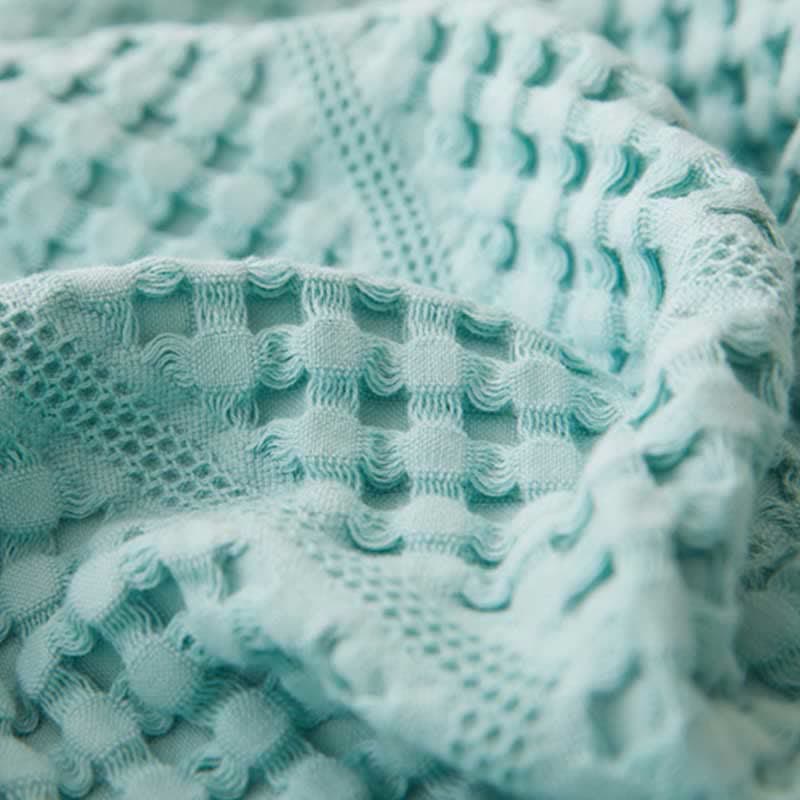 Couverture en serviette avec structure gaufrée de couleur unie