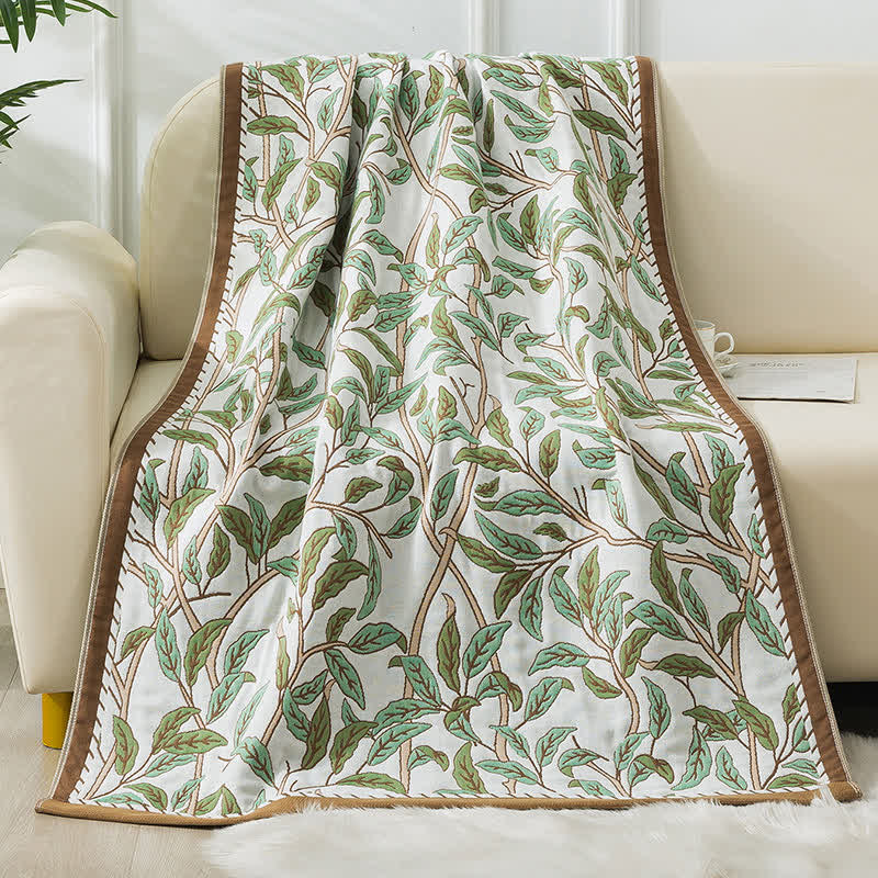 Serviette de bain en gaze de coton douce avec des feuilles pastorales