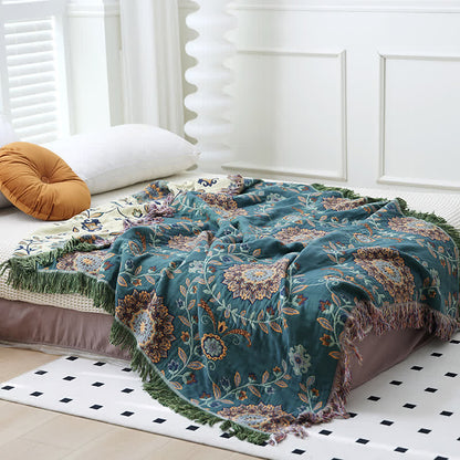 Couette réversible à motif floral et pompons en gaze de coton