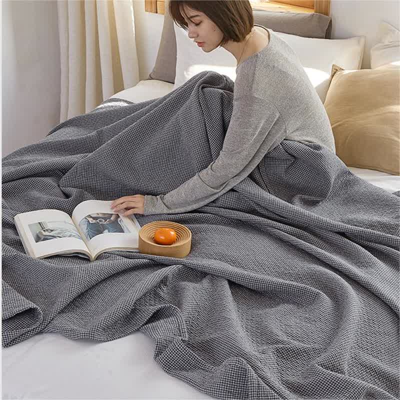 Couette réversible en coton à motif quadrillé uni