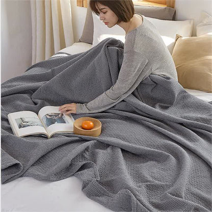 Couette réversible en coton à motif quadrillé uni