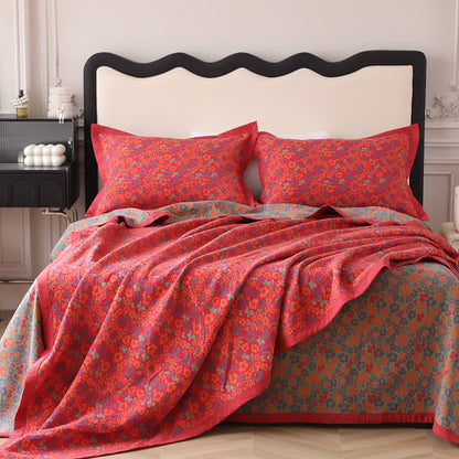 Couette réversible en gaze de coton à motif floral et jacquard