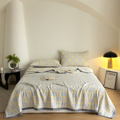 Couette en gaze de coton à trois couches avec des fleurs vibrantes