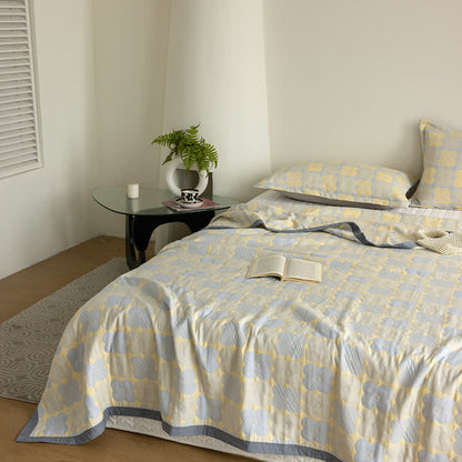 Couette en gaze de coton à trois couches avec des fleurs vibrantes