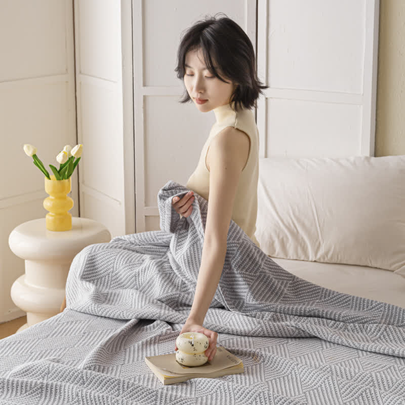 Couette douce en pur coton avec un motif de losange neutre