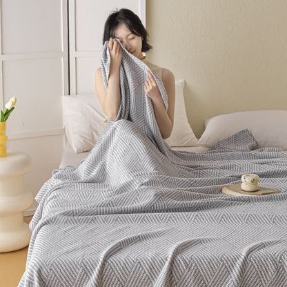 Couette douce en pur coton avec un motif de losange neutre