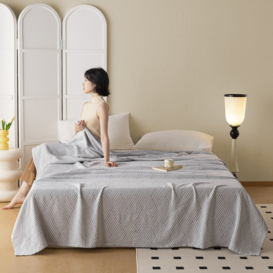 Couette douce en pur coton avec un motif de losange neutre