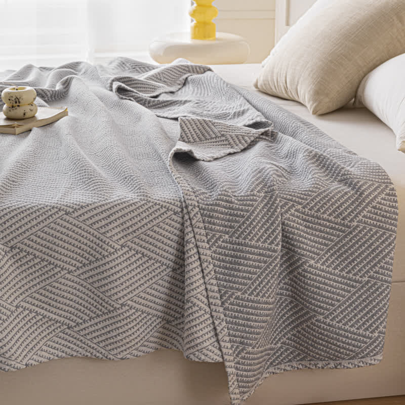 Couette douce en pur coton avec un motif de losange neutre
