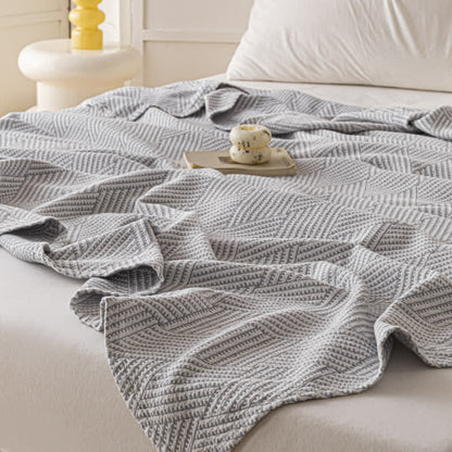 Couette douce en pur coton avec un motif de losange neutre
