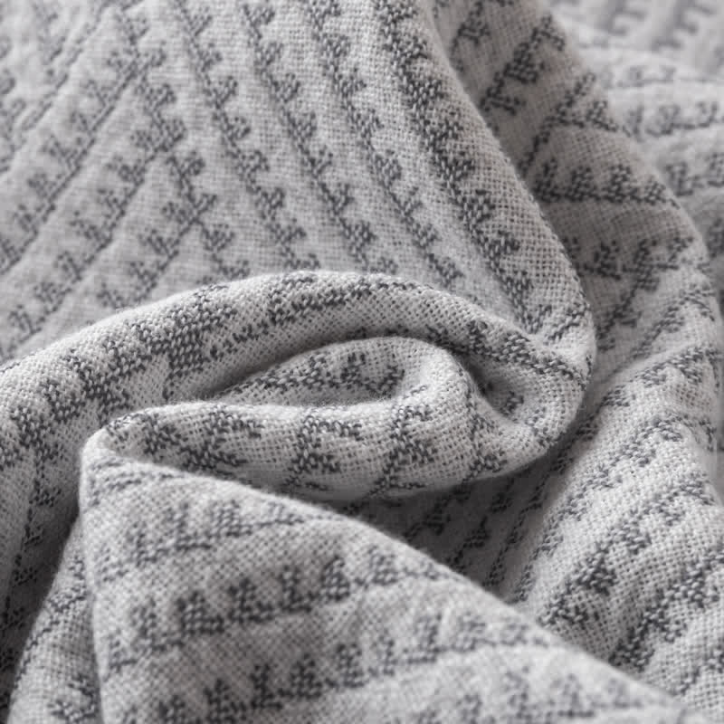 Couette douce en pur coton avec un motif de losange neutre