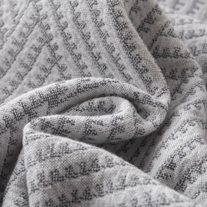 Couette douce en pur coton avec un motif de losange neutre