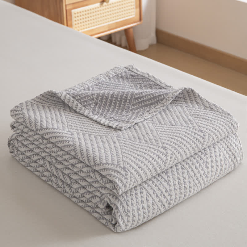Couette douce en pur coton avec un motif de losange neutre
