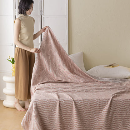 Couette douce en pur coton avec un motif de losange neutre