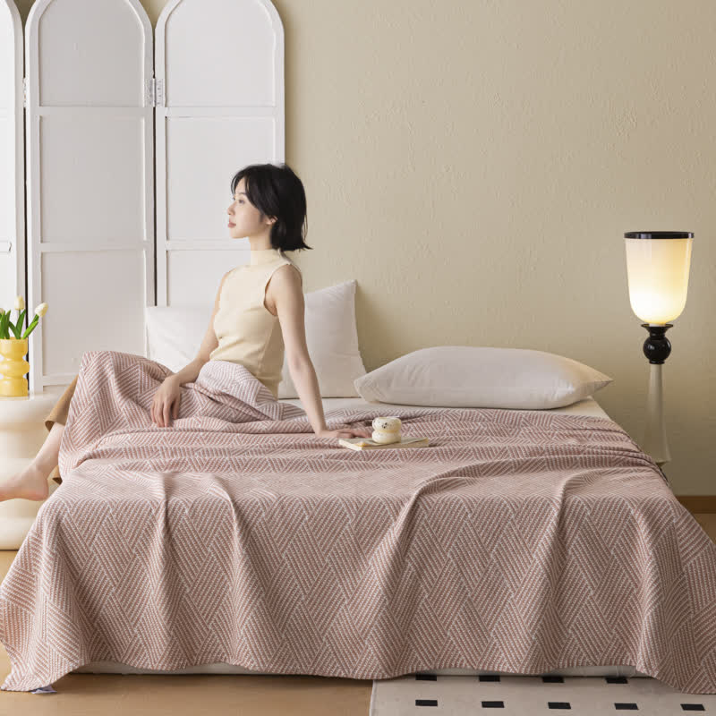 Couette douce en pur coton avec un motif de losange neutre