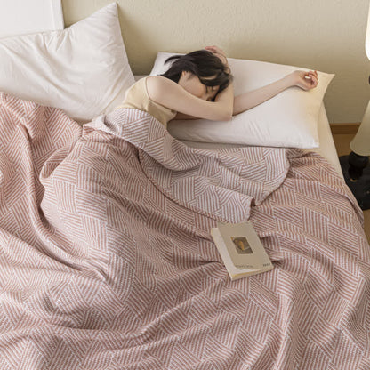 Couette douce en pur coton avec un motif de losange neutre