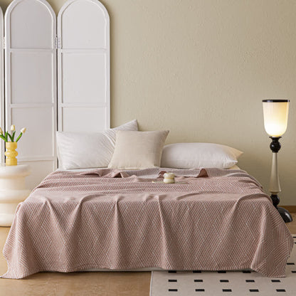 Couette douce en pur coton avec un motif de losange neutre