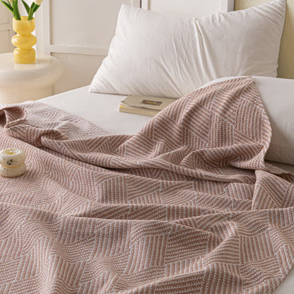 Couette douce en pur coton avec un motif de losange neutre