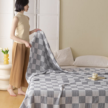 Couette moderne et respirante en pur coton avec un motif à damier