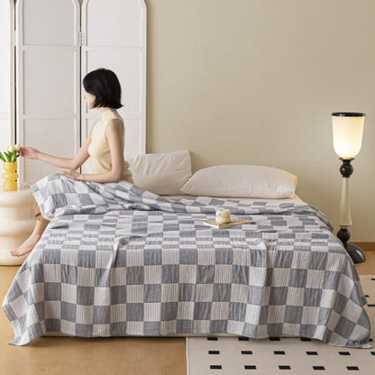 Couette moderne et respirante en pur coton avec un motif à damier