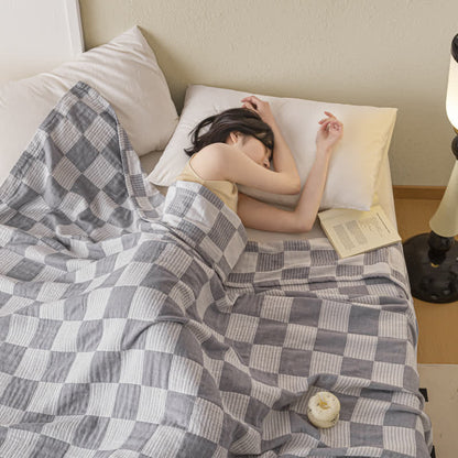 Couette moderne et respirante en pur coton avec un motif à damier