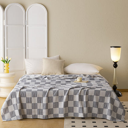 Couette moderne et respirante en pur coton avec un motif à damier