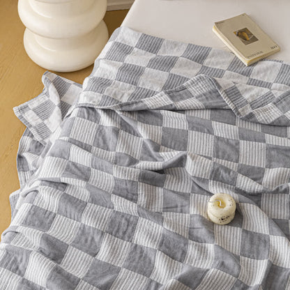 Couette moderne et respirante en pur coton avec un motif à damier