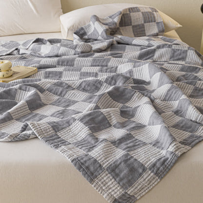 Couette moderne et respirante en pur coton avec un motif à damier
