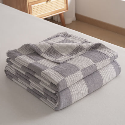 Couette moderne et respirante en pur coton avec un motif à damier