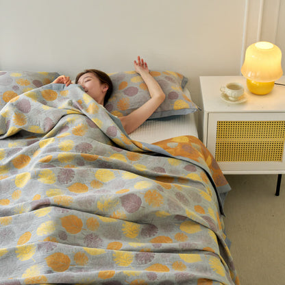 Couette réversible en gaze de coton jacquard à motifs de feuilles