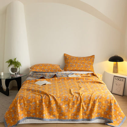 Couverture fonctionnelle respirante avec gaze à trois couches et motif floral