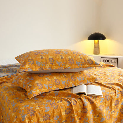 Couverture fonctionnelle respirante avec gaze à trois couches et motif floral