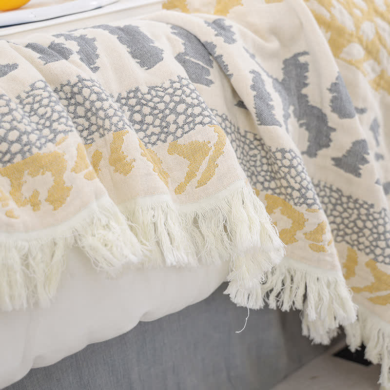 Couette en gaze de coton pur avec pompons et imprimé léopard
