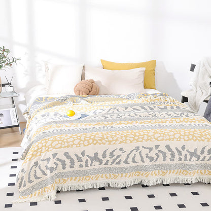 Couette en gaze de coton pur avec pompons et imprimé léopard