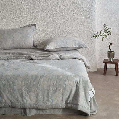 Collection de linge de lit en gaze de coton neutre à motif floral
