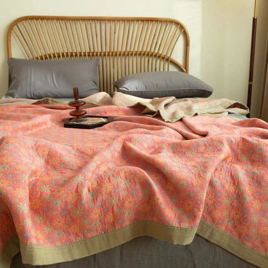 Couette réversible en coton avec motif de marguerites colorées