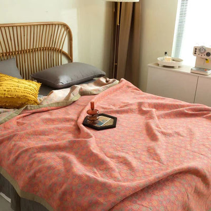 Couette réversible en coton avec motif de marguerites colorées