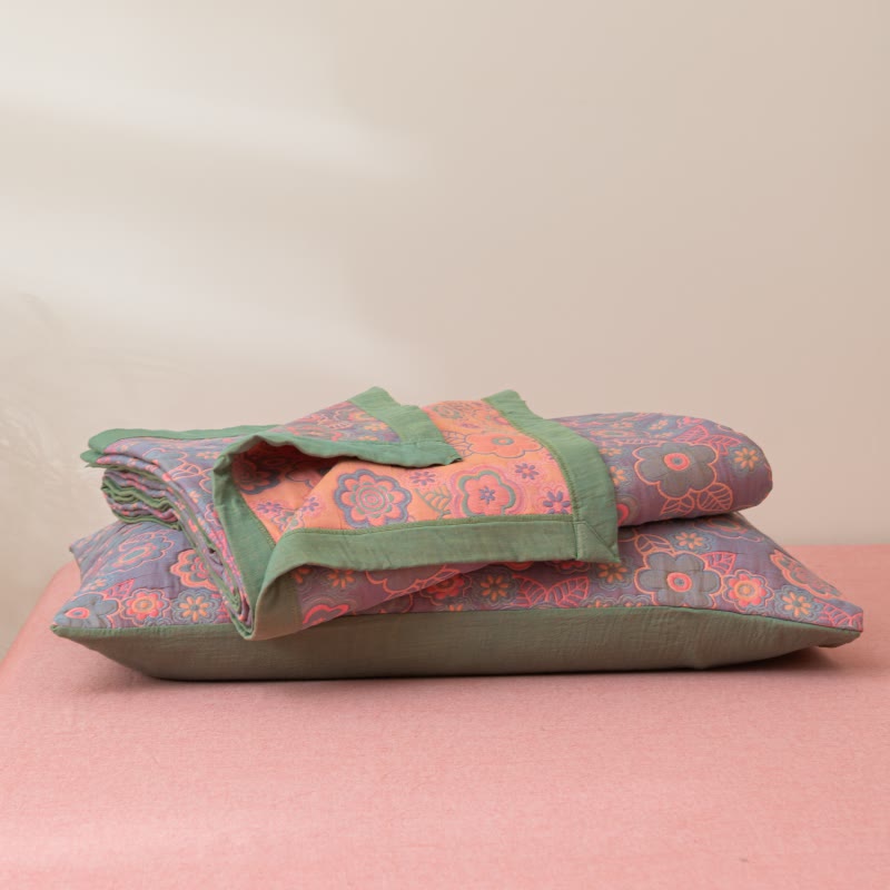 Couette réversible en gaze de coton à motif jacquard floral
