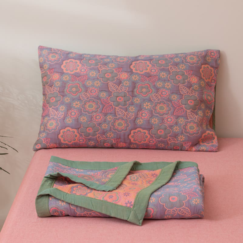 Couette réversible en gaze de coton à motif jacquard floral