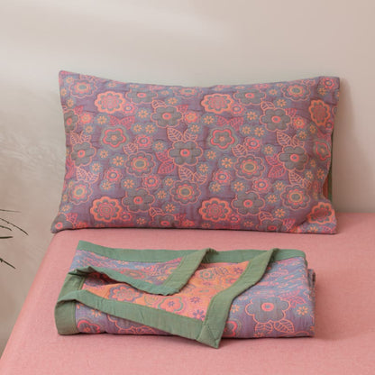 Couette réversible en gaze de coton à motif jacquard floral
