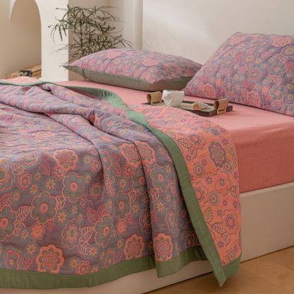 Couette réversible en gaze de coton à motif jacquard floral
